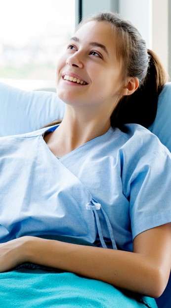 Woman Laying on a Medical Bed